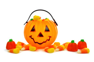Halloween Jack o Lantern candy collector with scattered candies